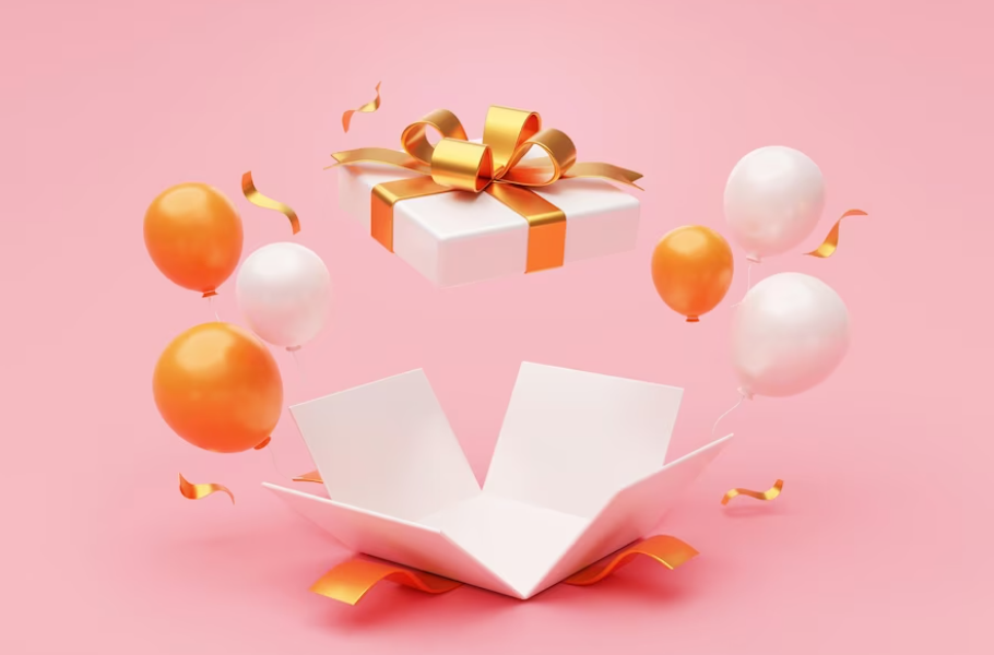 A gift box adorned with a golden ribbon floats above an open white box, orange and white balloons